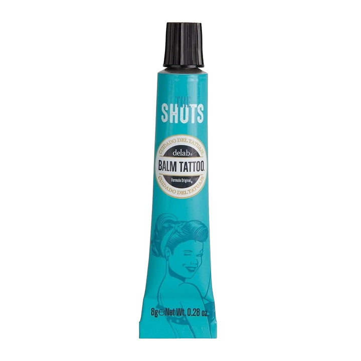 A single tube of Balm Tattoo Shot Original Formula, 8g – designed for effective tattoo aftercare with a retro-inspired pin-up design on vibrant blue packaging.